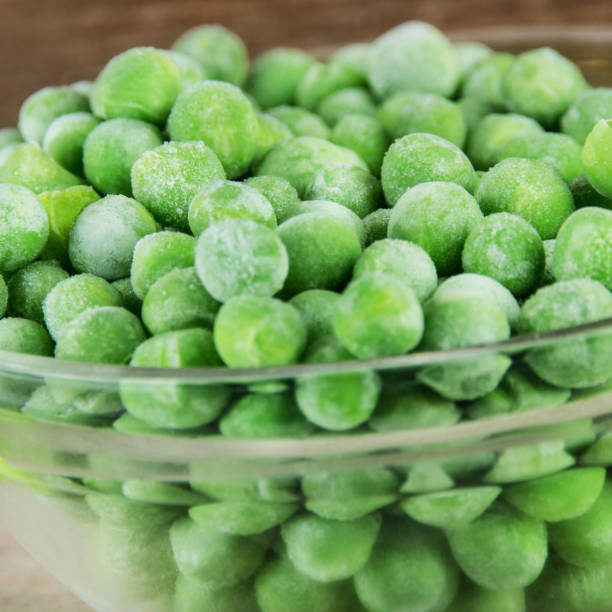 istock Deep frozen peas and close up 1186947322