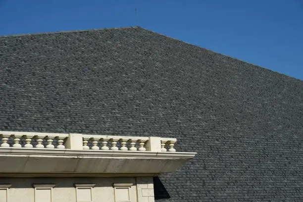 Photo of Roof of old historic castle made of tile in day light