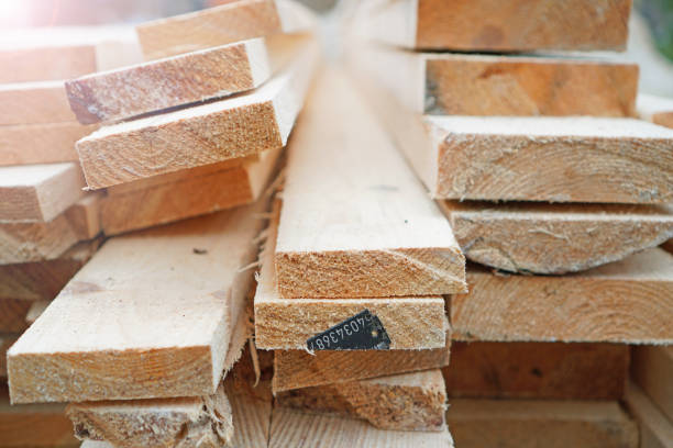istock Lumber purchase background. Stack with wooden boards of the same size. 1186948329