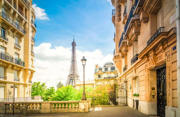 istock eiffel tour and Paris street 1186949434