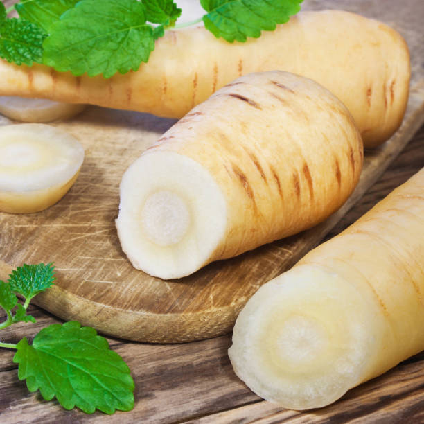 istock Parsnip vegetabes and fresh herbs 1186949689
