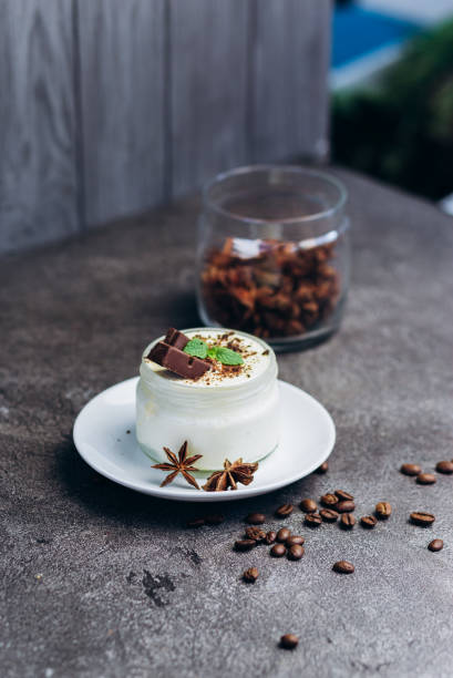 istock Panakota fresh cream dessert with chocolate on gray table. 1186949817