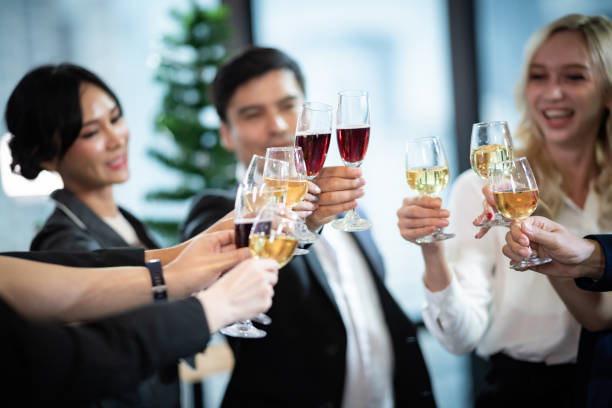 business partners toast champagne company event celebration success - party business toast champagne imagens e fotografias de stock