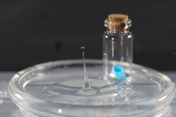 drop of water falling on the surface of the water