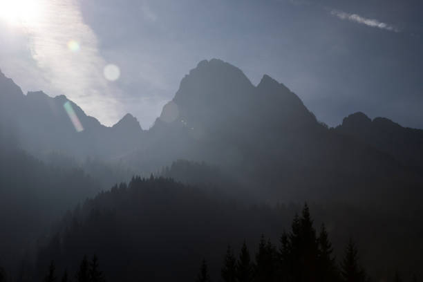 istock Dolomite mountains in morning mist. 1186952436