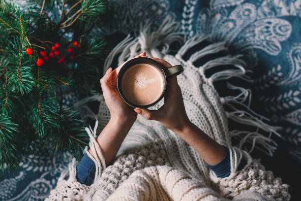 Hands holding hot cup of coffee. Hygge background. Hands holding hot cup of coffee. Hygge background. Christmas mood. hygge photos stock pictures, royalty-free photos & images
