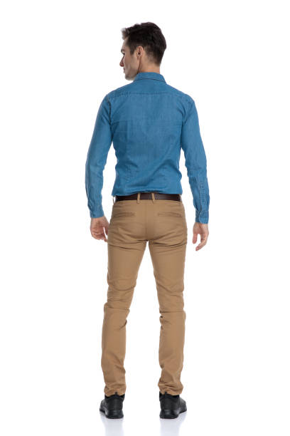 istock back view of smart casual man looking to side 1186953327