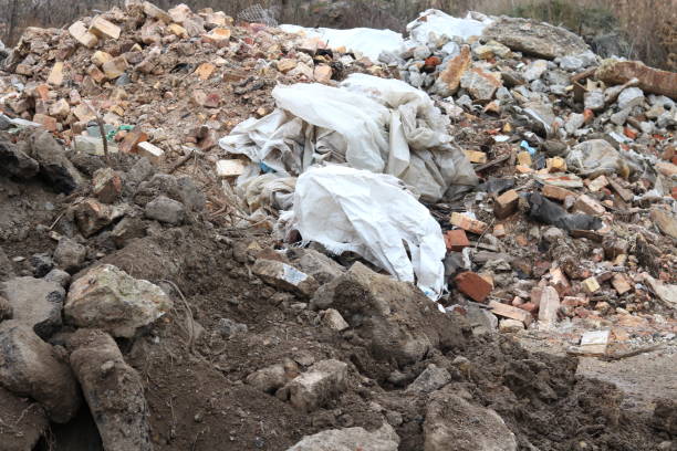 istock Construction waste with elements of various dismantled and destroyed old structures at landfill 1186953672