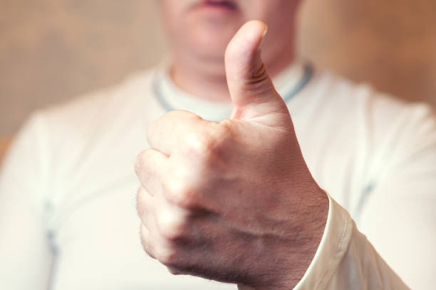 istock Man hand shows gesture all right. Close-up 1186956127