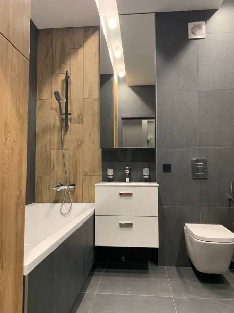 istock black designer bathroom with wood 1186956410