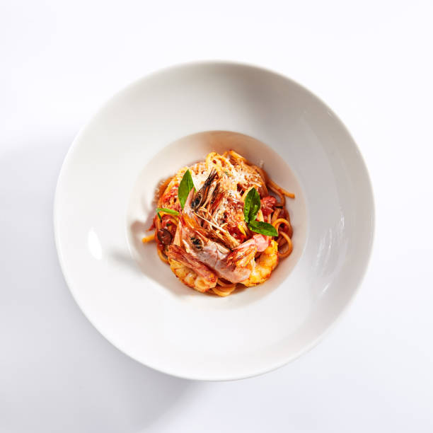 istock Shrimp linguine with smoked red pepper sauce 1186957363