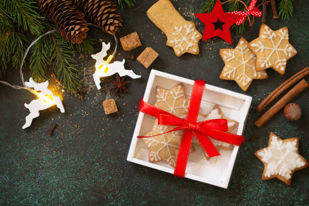 istock Christmas gingerbread cookies and ingredients for baking. Culinary background. Top view flat lay background with copy space. 1186957525