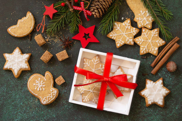 istock Christmas gingerbread cookies and ingredients for baking. Culinary background. Top view flat lay background. 1186957526
