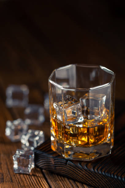 istock Whiskey in glass with ice 1186959200
