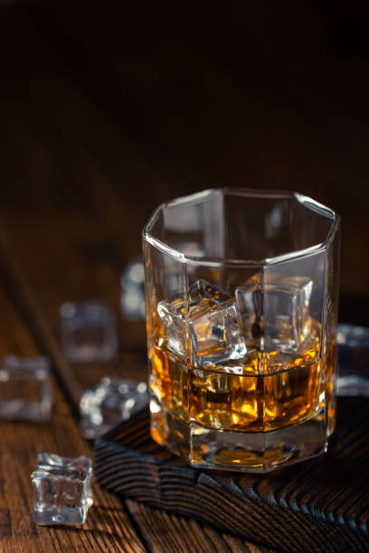 istock Whiskey in glass with ice 1186959220