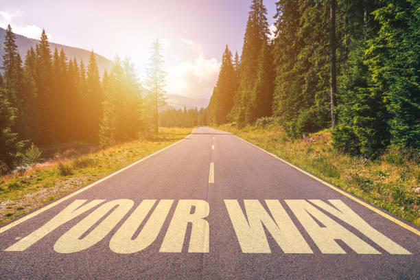 istock Your way text written on road in the mountains 1186959854