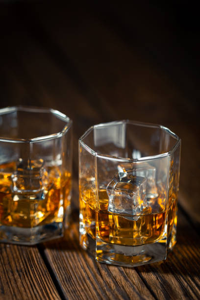 istock Whiskey in glass with ice 1186961103