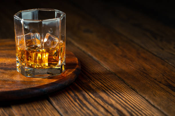 istock Whiskey in glass with ice 1186961967