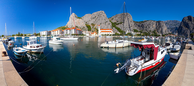 Boats in the fishing harbor at the mouth of the river. Omis. Croatia.