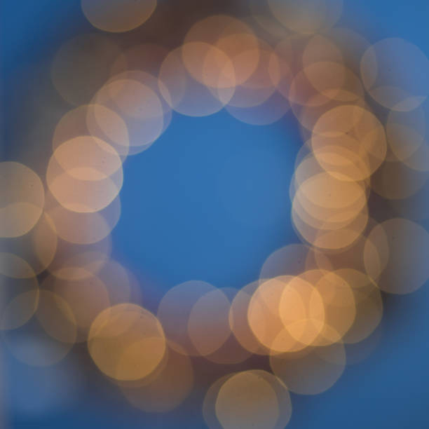 istock Christmas wreath lights background 1186963194