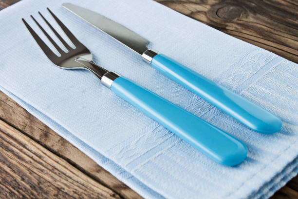 istock Blue cutlery and table napkin 1186963256