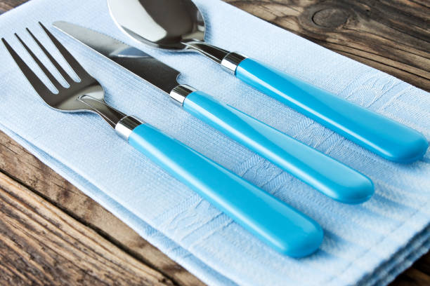 istock Blue cutlery and table napkin 1186963302