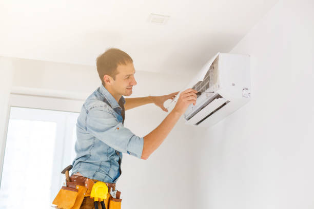 istock man repair air conditioner 1186963432