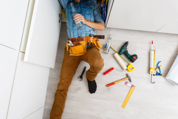 istock drunk plumber doing sink reparation 1186966133