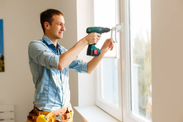 istock Close-up of a handyman fixing window frame 1186967178