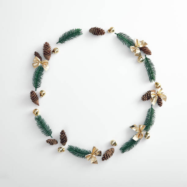 istock Christmas wreath made from tree branch, pine cone and xmas bauble 1186967606