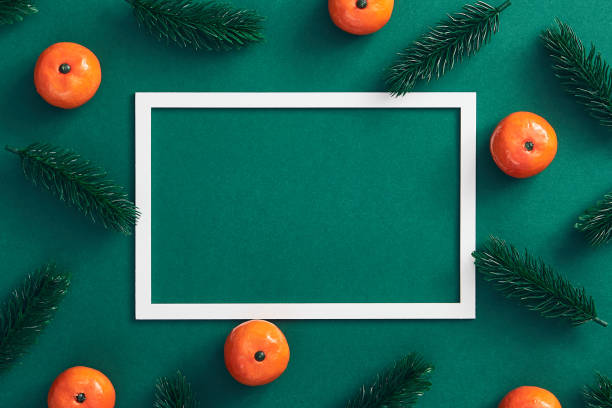 istock Christmas composition on dark green background 1186967640