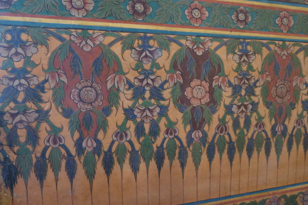 istock Floral pattern on the wall of an ancient Buddhist temple. 1186970078