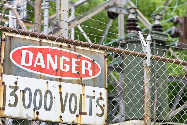 istock Danger sign in front of high voltage equipment 118697031