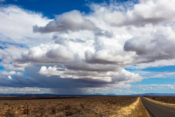 istock Clouds and rain in the distance in the Karoo 1186972224