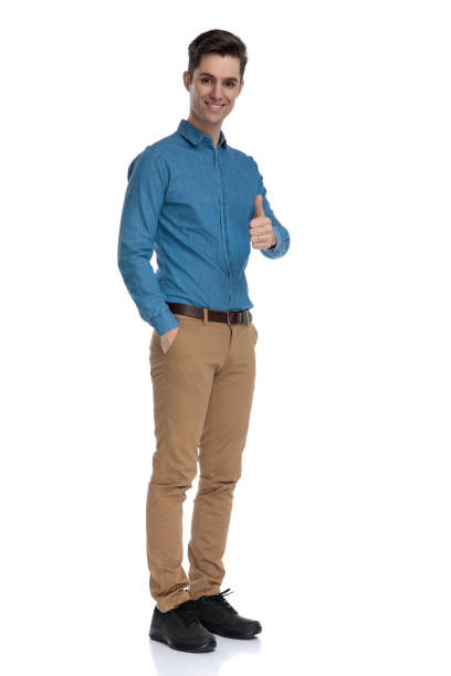 istock smart casual man making thumbs up sign and smiling 1186973853