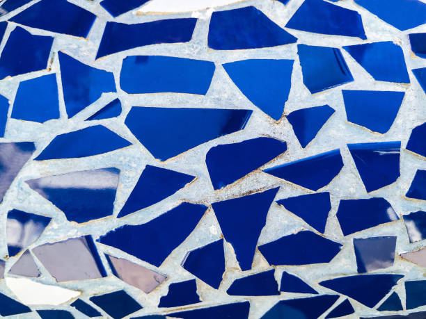 istock Barcelona. Blue mosaic wall decorative ornament from ceramic broken tile. Background, copy space. 1186974914