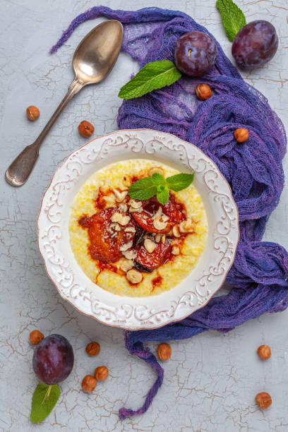 istock Millet porridge with caramelized plum and hazelnuts. 1186975302