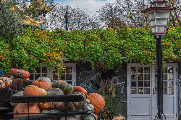 Copenhagen, Denmark, October 25, 2019: Tivoli Gardens opens every year for Halloween with friendly ghosts, spiders, scarecrows and over 20,000 pumpkins that provide the setting for Garden’s atmospheric autumn season.