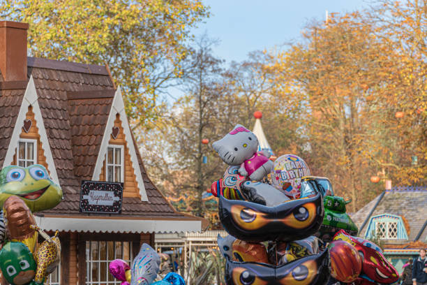 Copenhagen, Denmark, October 25, 2019: Tivoli Gardens opens every year for Halloween with friendly ghosts, spiders, scarecrows and over 20,000 pumpkins that provide the setting for Garden’s atmospheric autumn season.