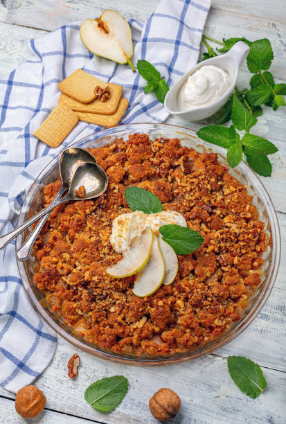 istock Pear crumble with a sprig of mint. 1186978405