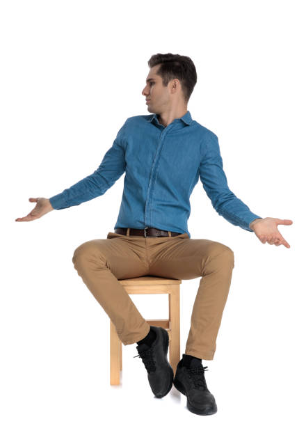 istock smart casual man talking and gesticulating to side 1186978435