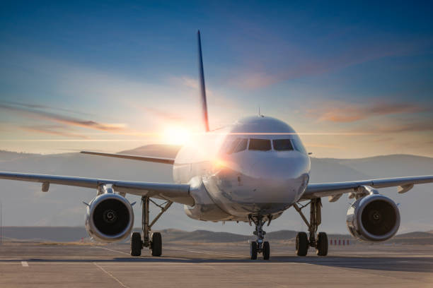 istock Passenger Arplane On Airport Runway 1186978597