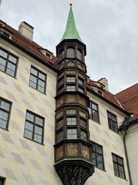istock beautiful old house with a tower in munich 1186979571
