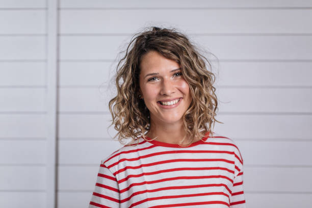 Fashion model toothy smiling Gorgeous curly haired woman portrait eastern europe stock pictures, royalty-free photos & images