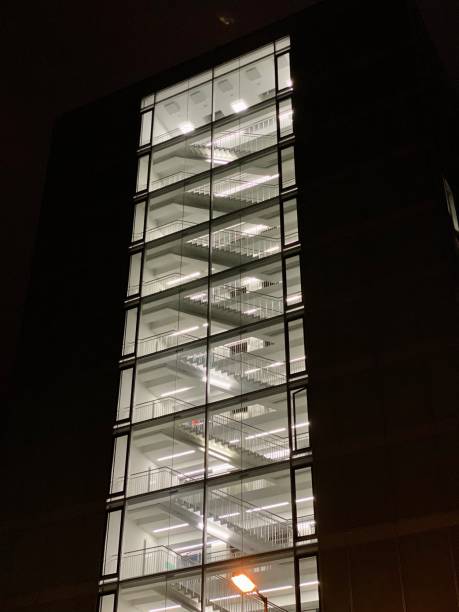istock lighted stairs in a building at night 1186979889