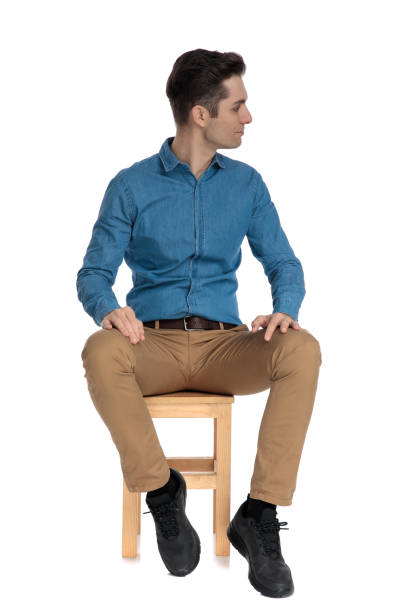 istock smart casual man looking to side and listening 1186980062