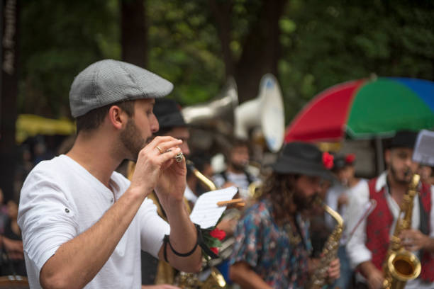 São Paulo, SP, Brazil - November 11, 2019: Street musician performs at Paulista Avenue which is closed to traffic on Sundays for leisure activities