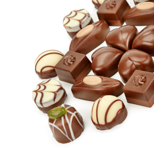istock Various chocolate pralines isolated on white background. 1186983335