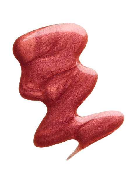 istock Blot of ruby nail polish isolated on white. Photo 1186985720