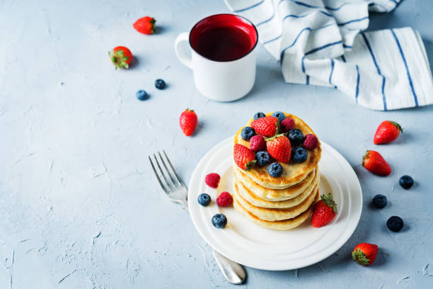 istock pancakes with strawberries, blueberries and raspberries 1186987153